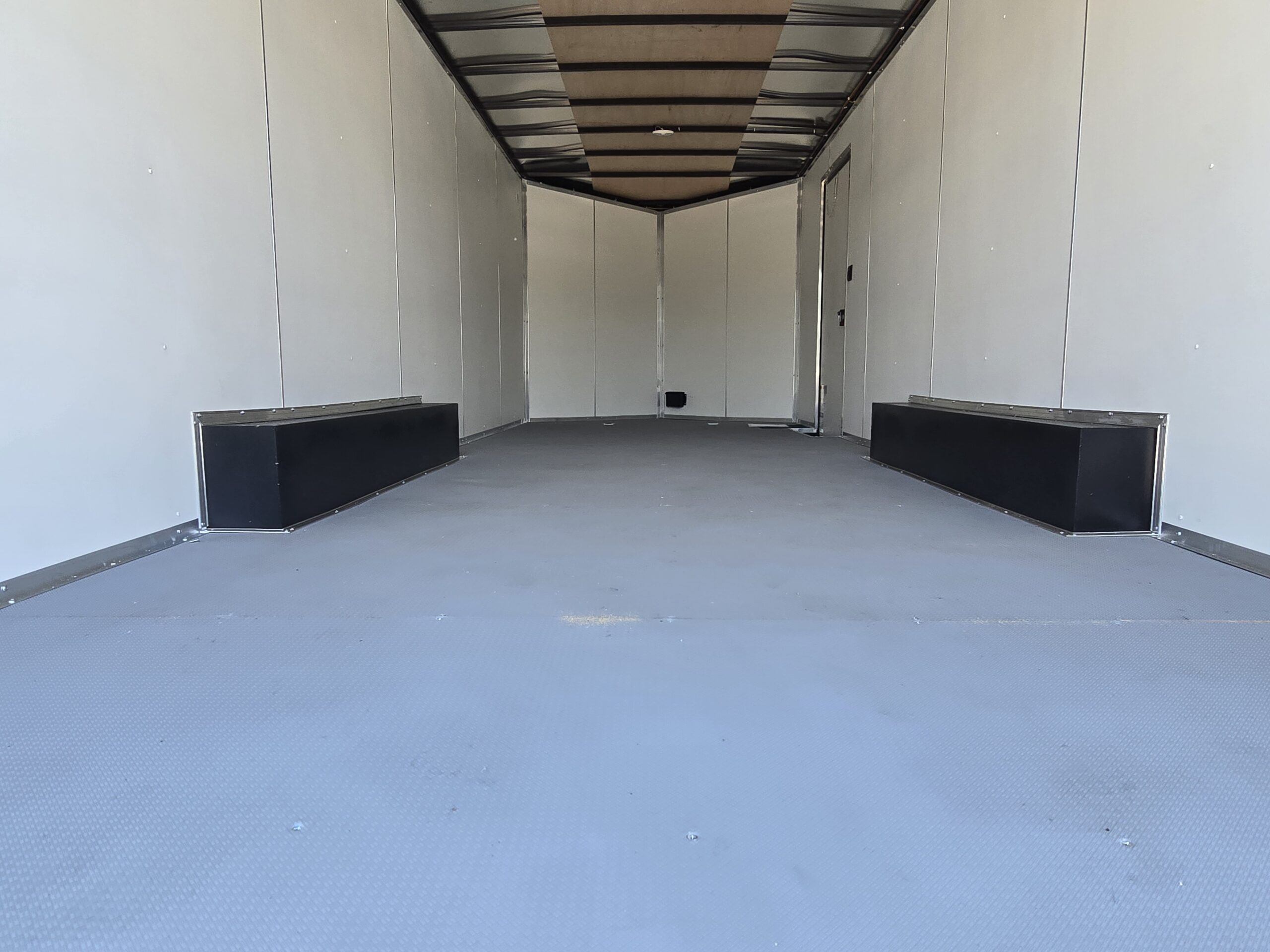 2025 E-Series by Cargo Mate 8.5×20 Extra Height Enclosed Car Hauler Cargo Trailer Pure Black .040 Black Aluminum with Polybead Floor & White vinyl walls - Image 3