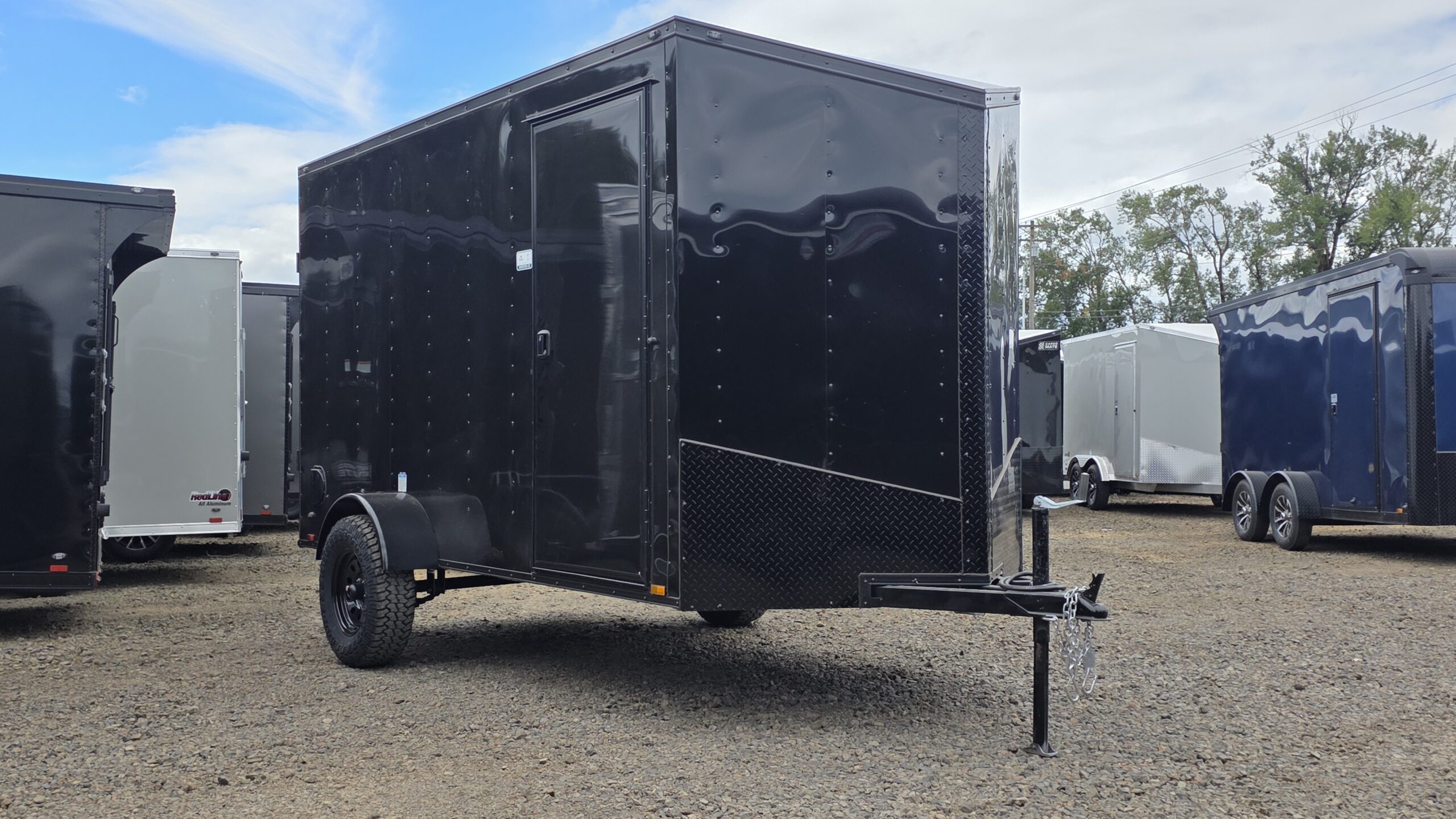 (Sold Out More Coming Soon!) 2026 Enclosed Cargo Trailer by Cargo Mate 6×12 12″ Extra Height 4″ Axle Lift with Brakes