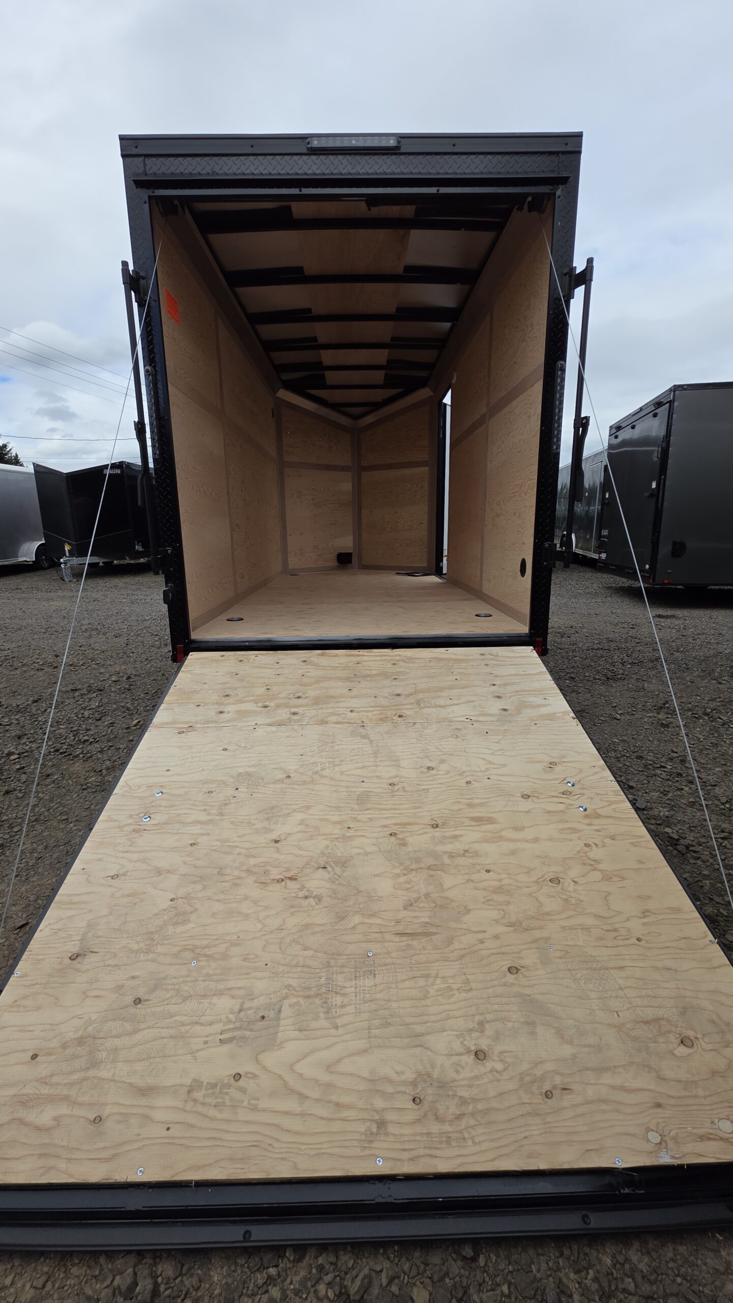 (Sold Out More Coming Soon!) 2026 Enclosed Cargo Trailer by Cargo Mate 6×12 12″ Extra Height 4″ Axle Lift with Brakes - Image 2