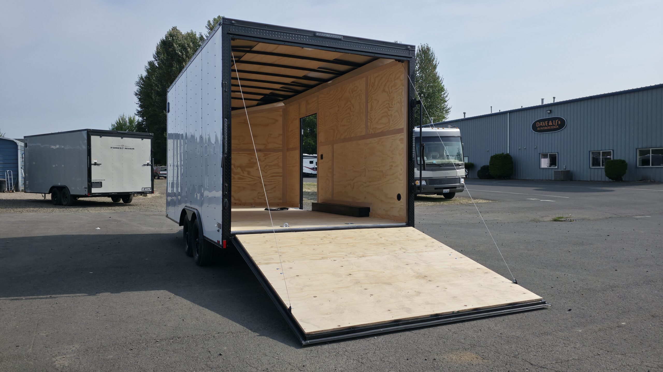 2026 E-Series by Cargo Mate 8.5×18 Extra Height Enclosed Car Hauler Cargo Trailer 78″ Ramp Door Opening 4″ Lift - Image 4