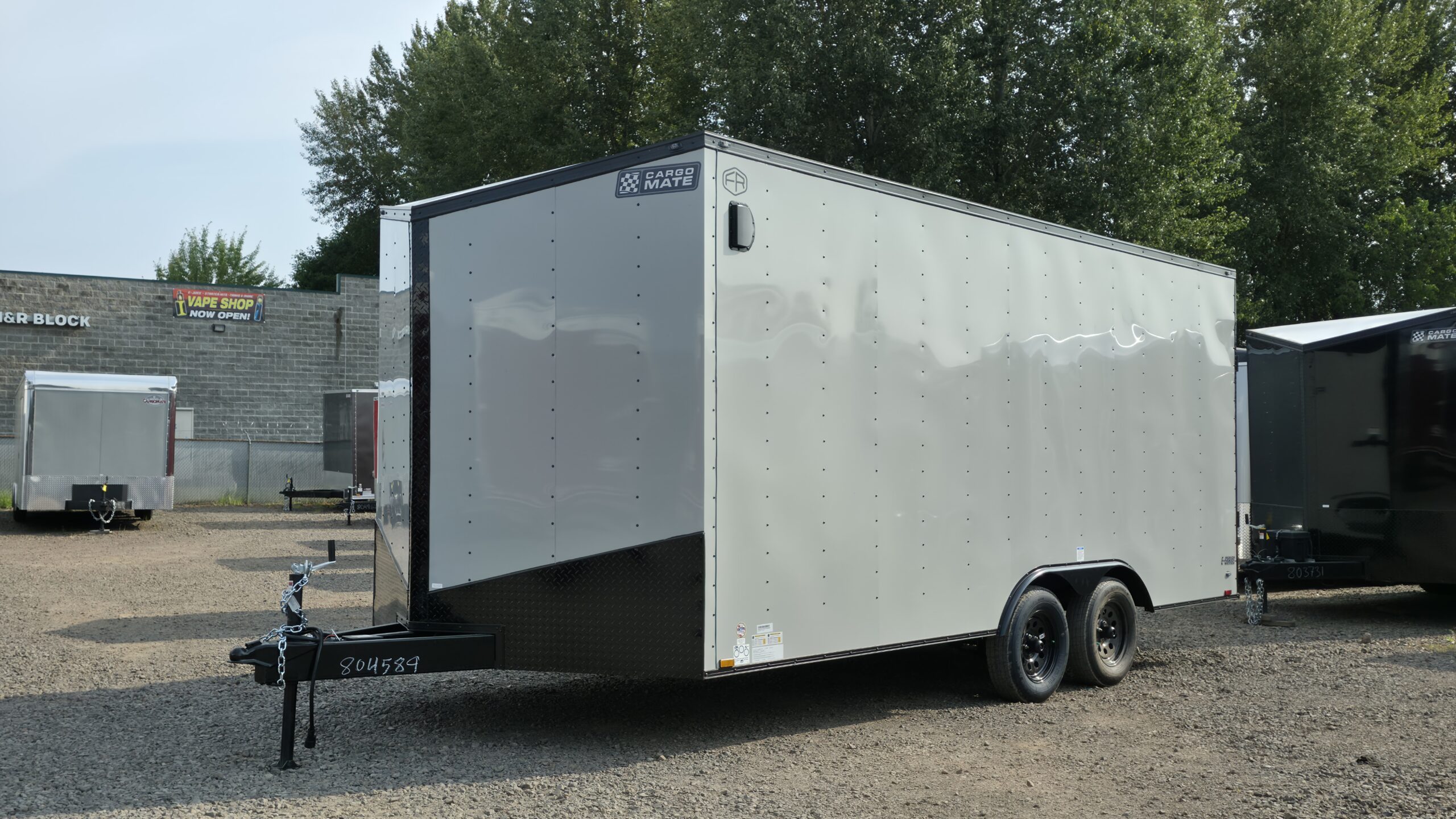 2026 E-Series by Cargo Mate 8.5×18 Extra Height Enclosed Car Hauler Cargo Trailer 78″ Ramp Door Opening 4″ Lift