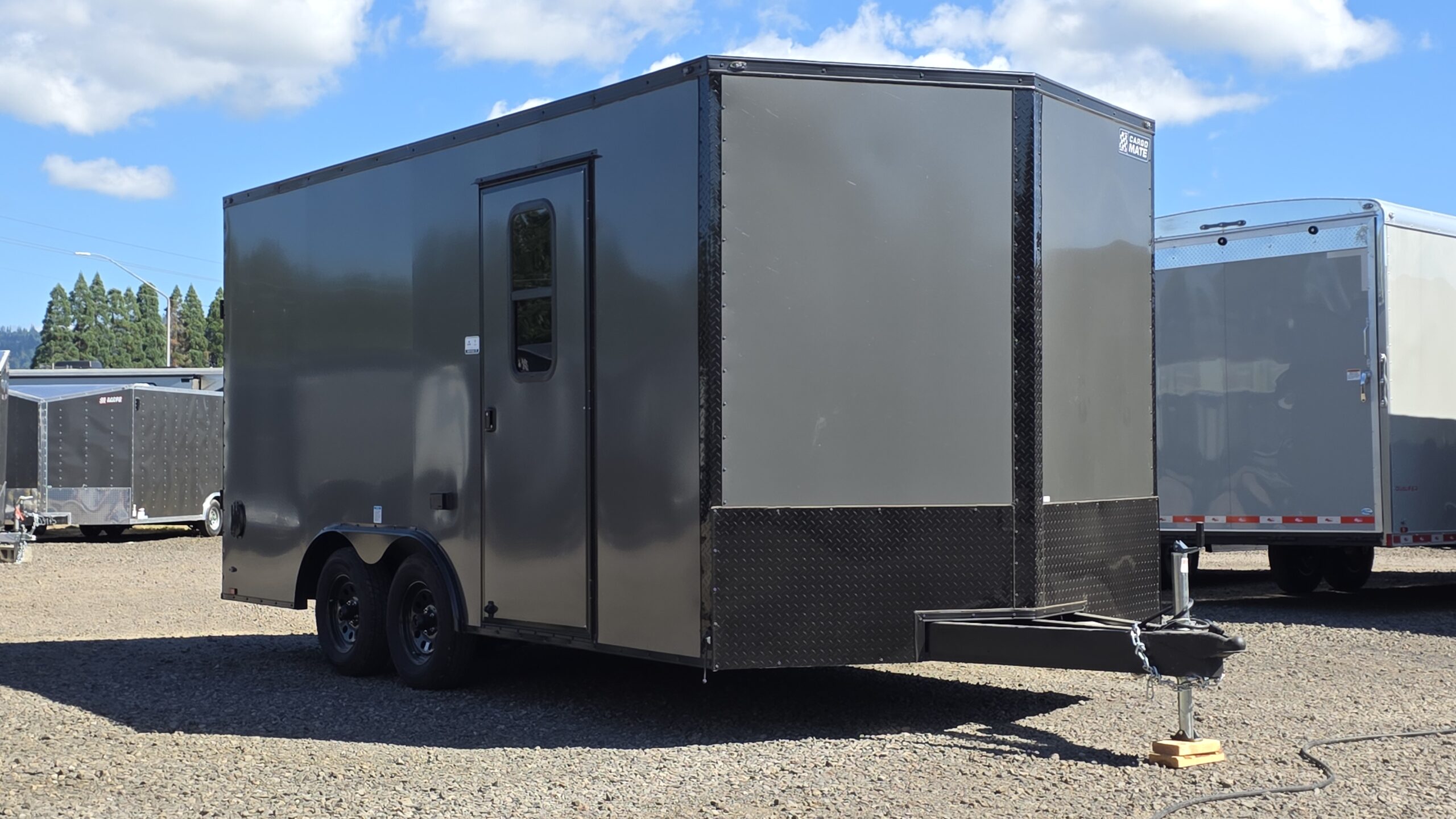 2026 E-Series by Cargo Mate 8.5×16 Extra Height Enclosed Cargo Trailer 110v PolyCORE Siding