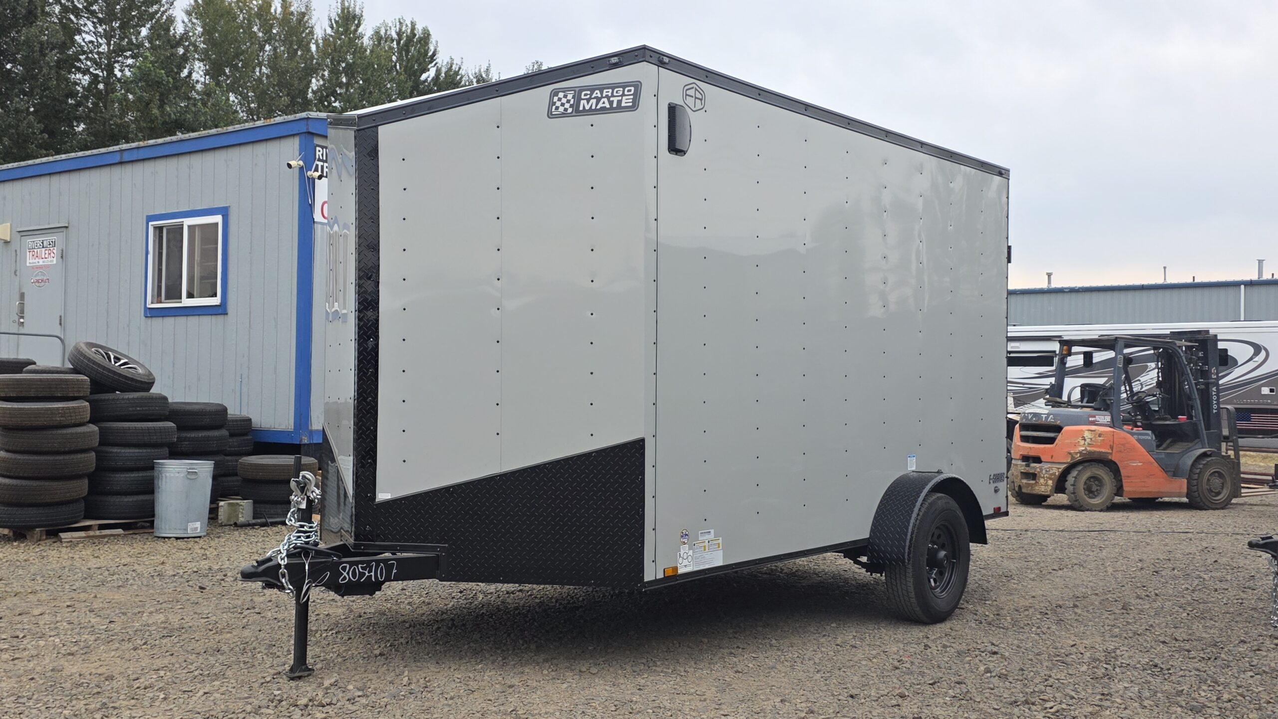 2026 Cargo Mate E-Series Enclosed Trailer 7×12 5200GVW Extra Height Ramp Door 4″ lift