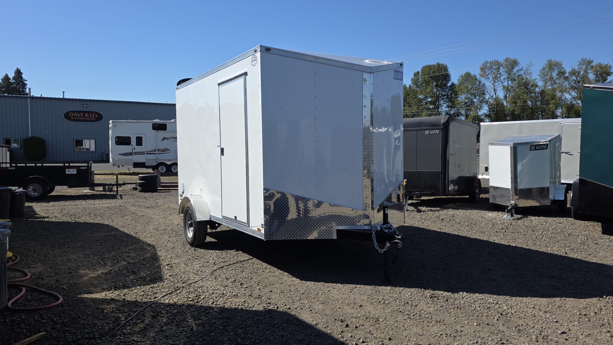 2026 Cargo Mate E-Series Enclosed Trailer 7×12 5200GVW Extra Height Ramp Door 4″ lift